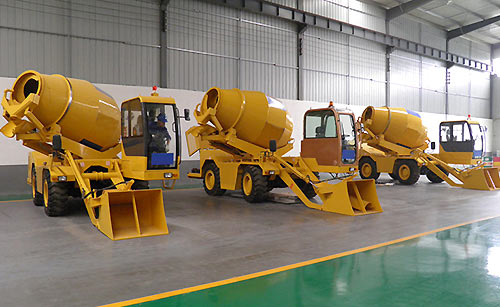 Self-loading mobile concrete mixer